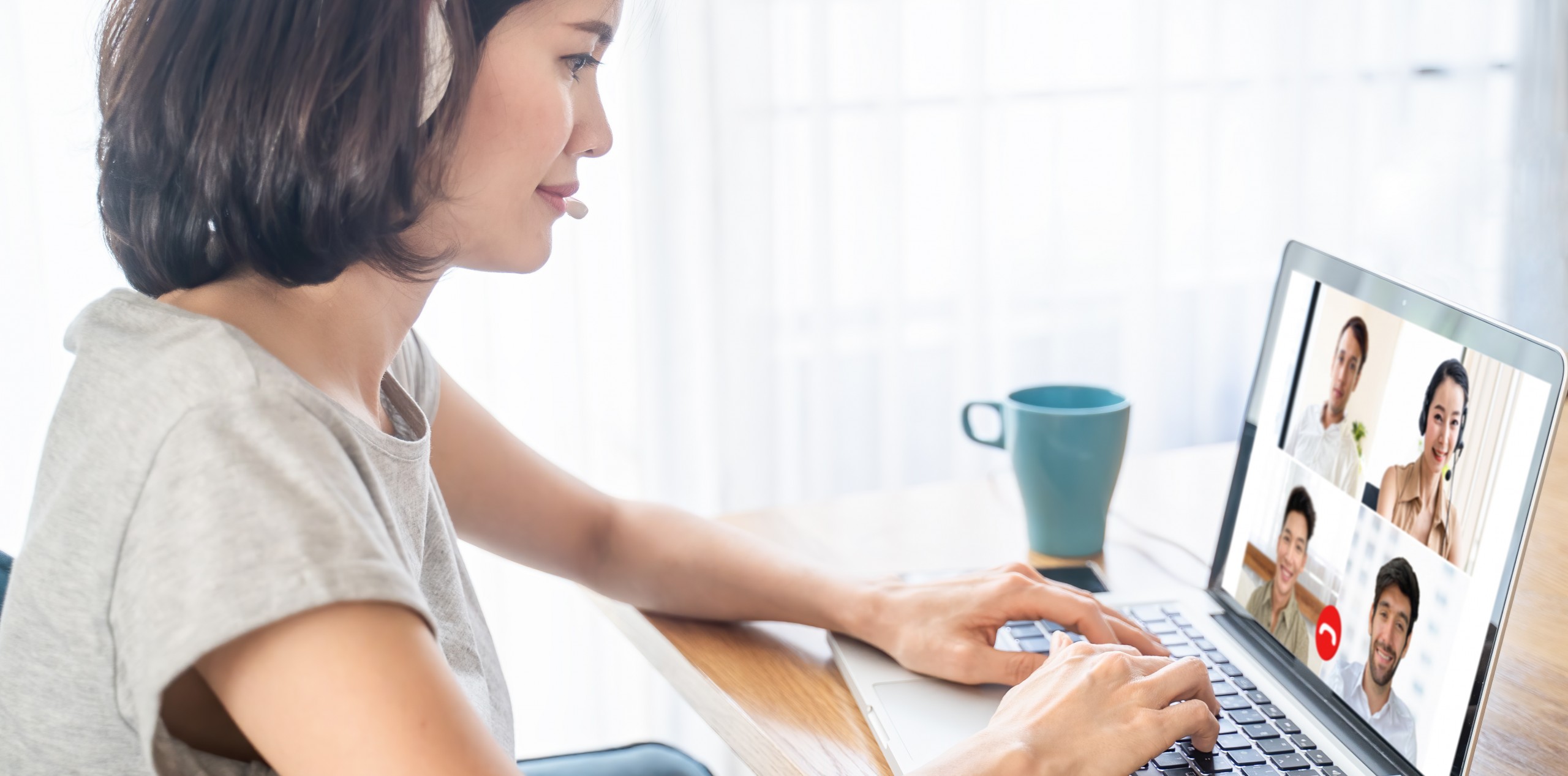 Women working from home on a Zoom Call